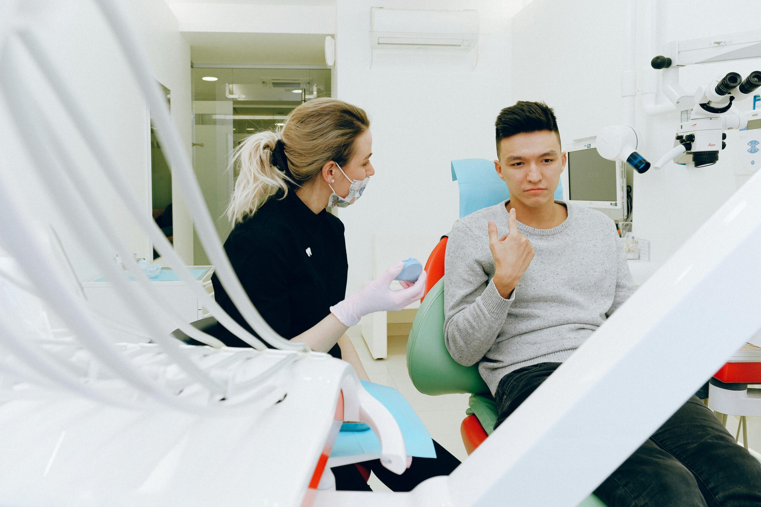 person in chair at a dentist appointment with family dentist